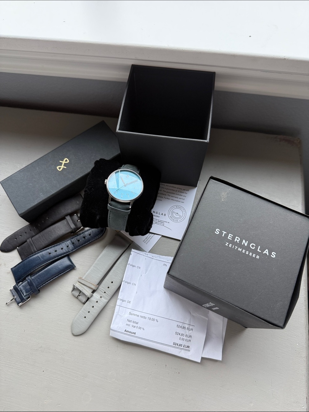 Sternglas Watch with Light Blue Dial and Black Strap